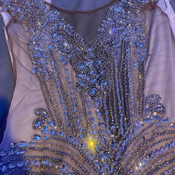 Crystal detail with a solid white spandex back stretchy fitted dress.